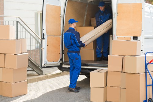Docklands Man and Van service agreement document and moving vehicle