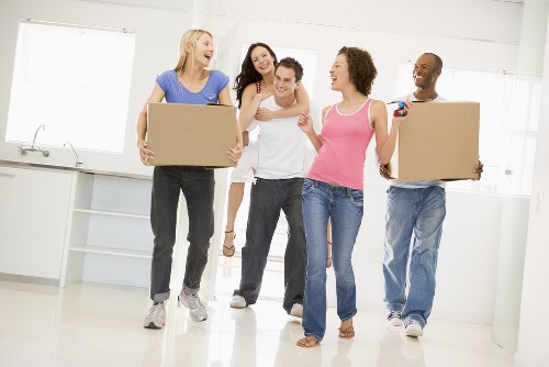 Van loading scene with trained movers using protective equipment