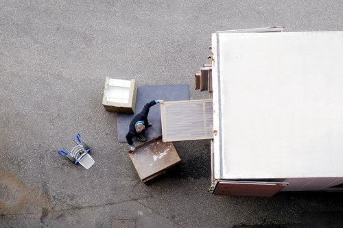 Local removal van loading household items for transport
