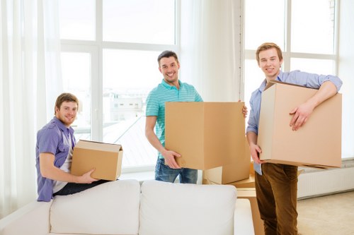 Docklands residents planning a home move with boxes and furniture