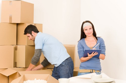 Packed boxes and furniture loaded into a removals van