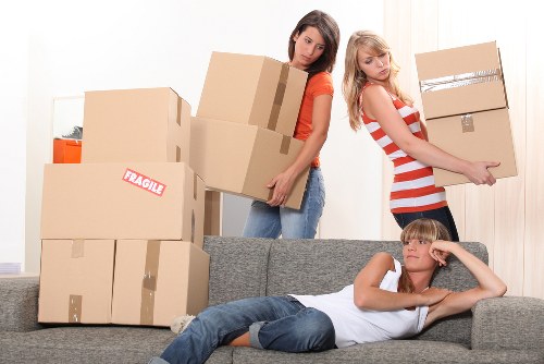 Packed household boxes ready for transport during a Docklands relocation